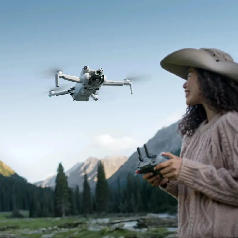 DJI Mini 4 Pro Fly More Combo  Includes RC 2 Remote Controller & Extended Flight Accessories